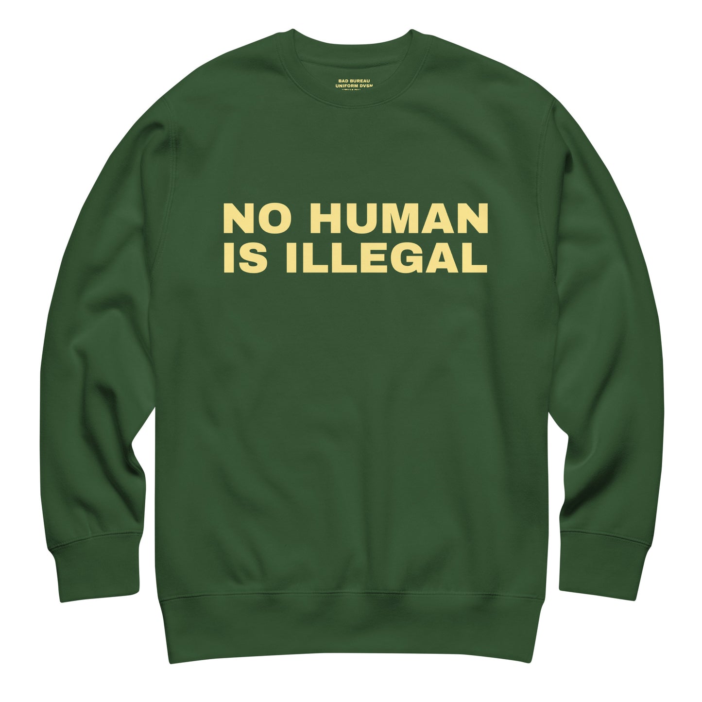 NO HUMAN IS ILLEGAL Crewneck Front View in Forest | BAD BUREAU 