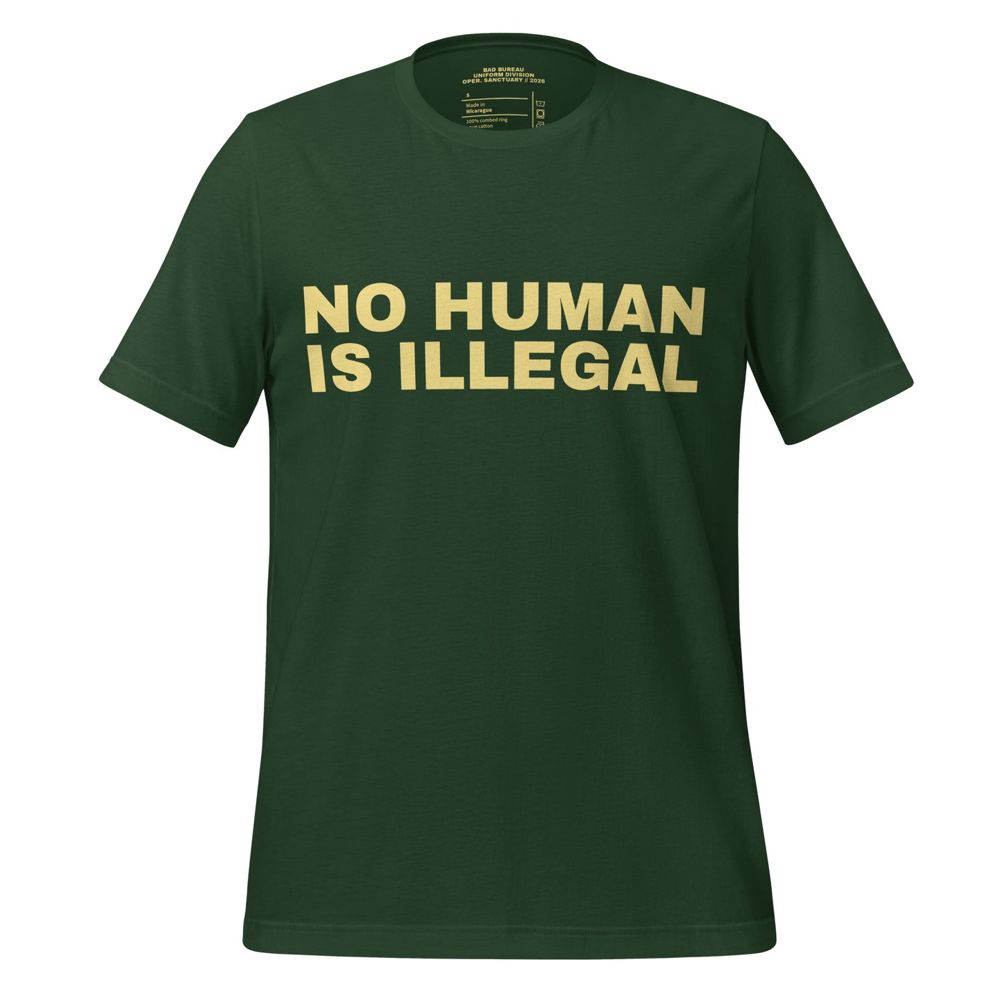 NO HUMAN IS ILLEGAL T-Shirt Front View in Forest | BAD BUREAU 