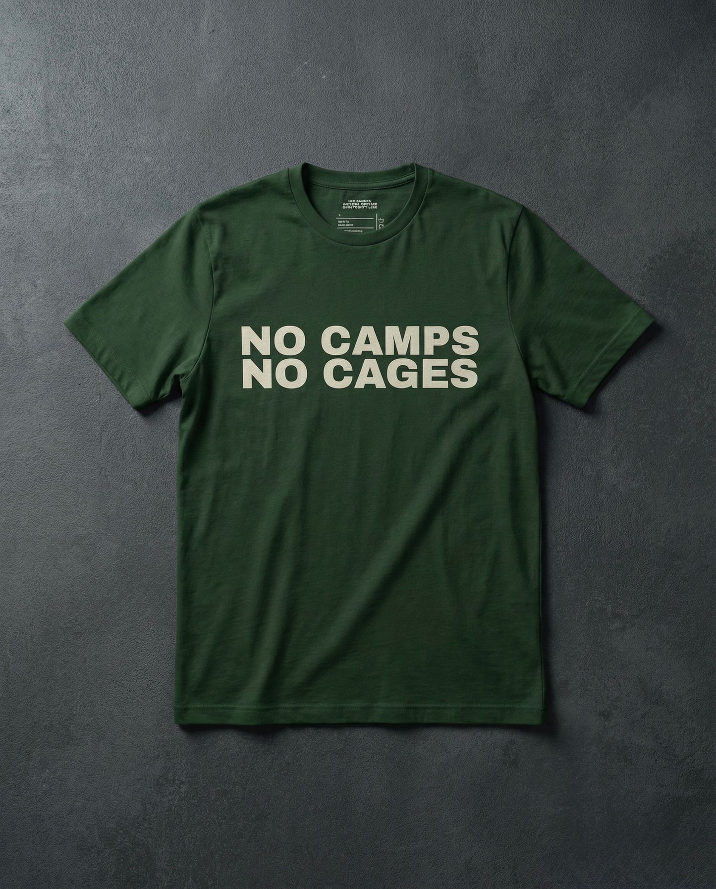 NO CAMPS NO CAGES T-Shirt concrete background in forest | BAD BUREAU